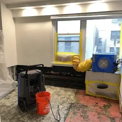 Drying gear set out in a room after a water loss