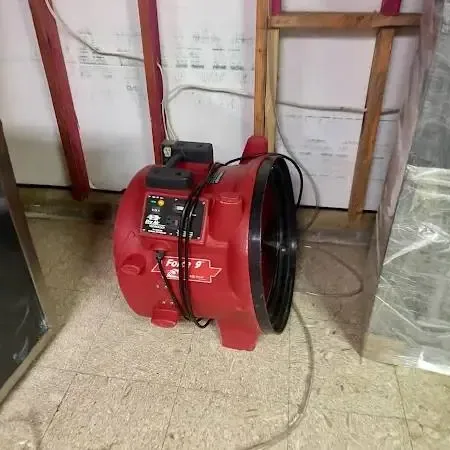 Drying equipment set up in a room after a water loss